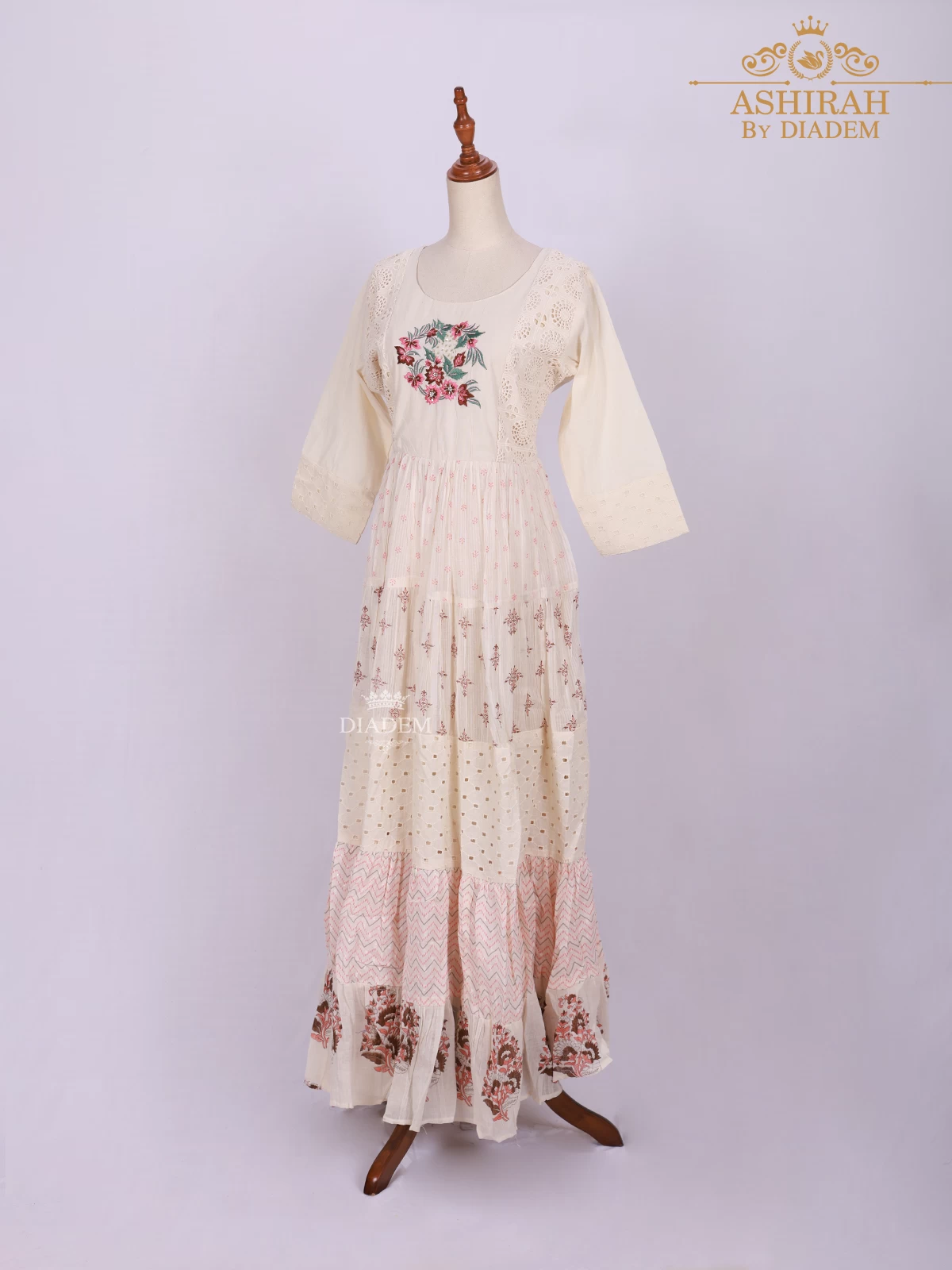 Ivory Long Kurti Adorned With Floral Prints And Thread Work Embroidery