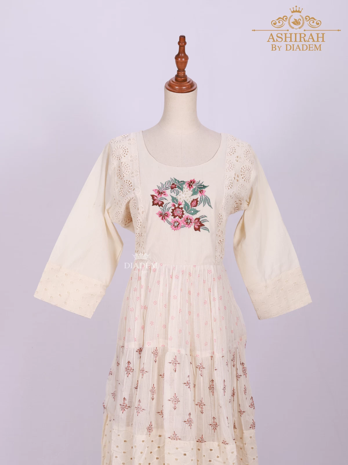 Ivory Long Kurti Adorned With Floral Prints And Thread Work Embroidery