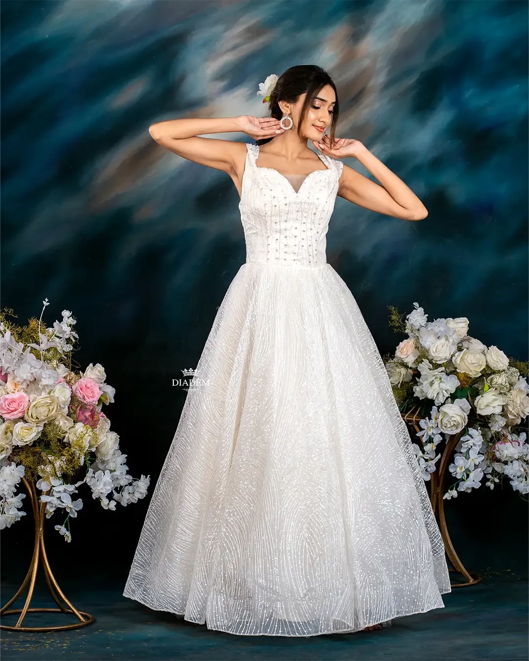 White Net Gown Embellished With Sequins And Thread Work
