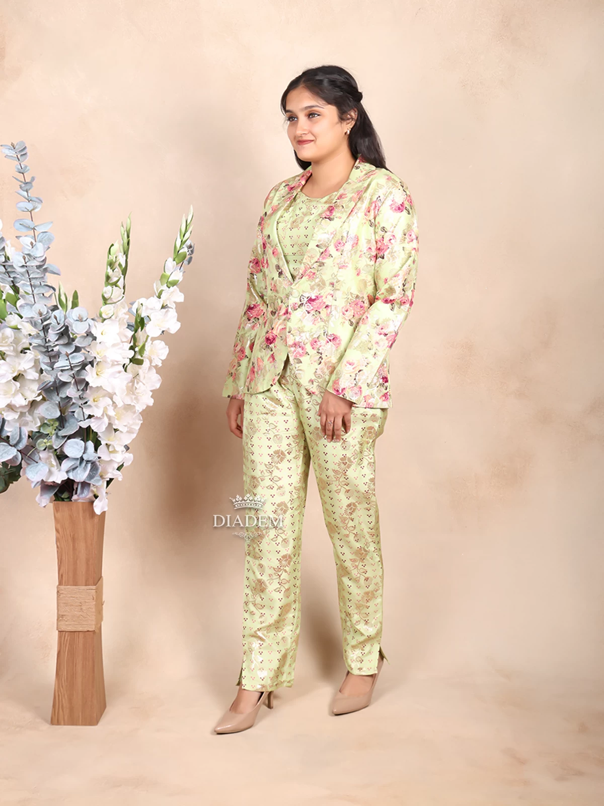 Pista Green Pant Suit Adorned With Floral Prints Paired With Matching Overcoat