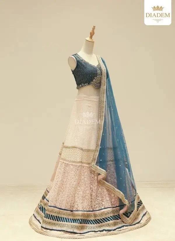 White With Blue Bridal Lehenga Embellished In Sequins And Threads With Dupatta
