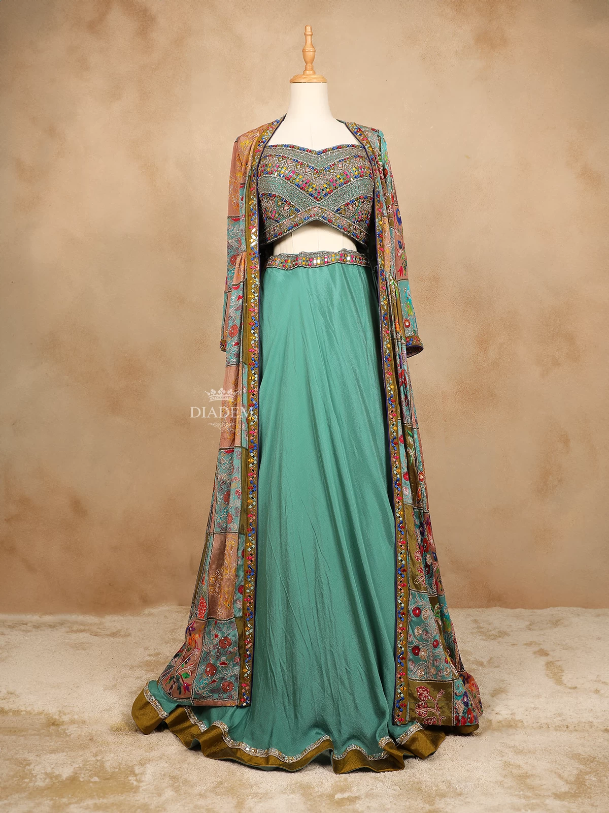 Green Georgette Lehenga with Embroidery and Mirrorwork paired with Overcoat