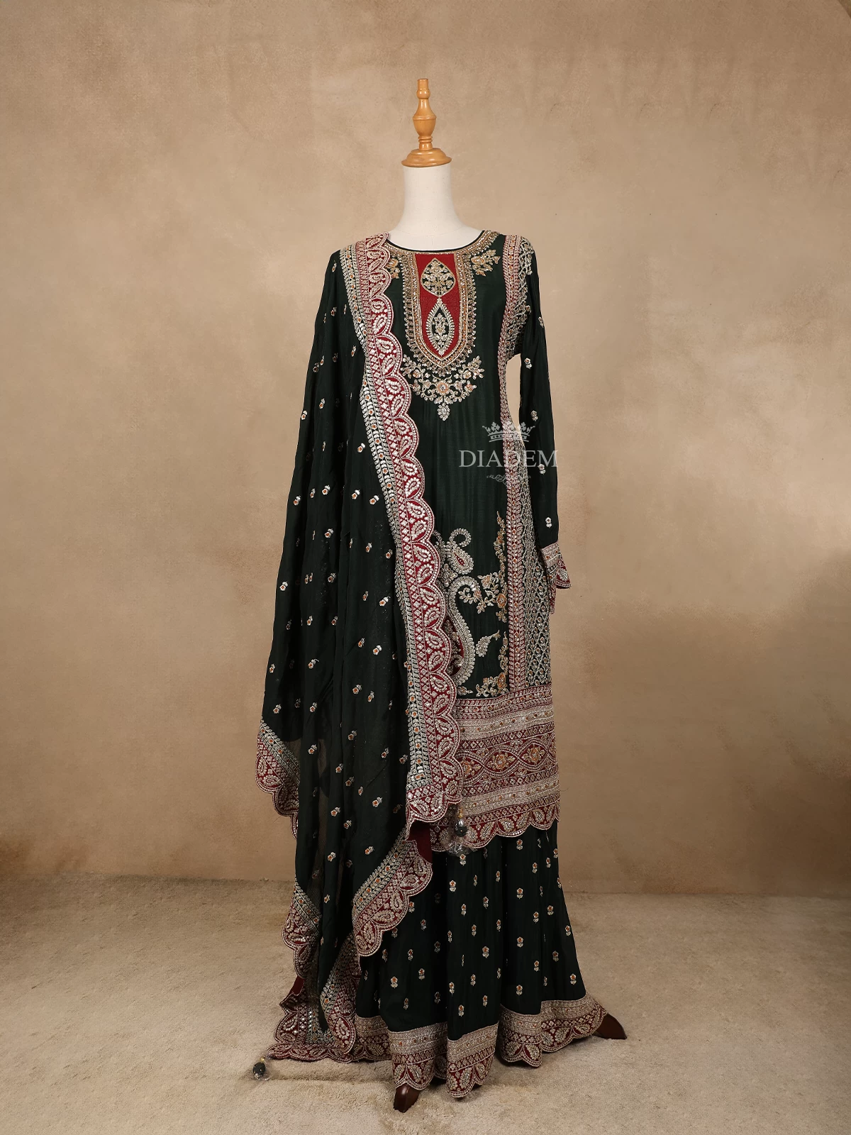 Dark Green Georgette Lehenga Embellished with Floral Embroidery Paired with Dupatta