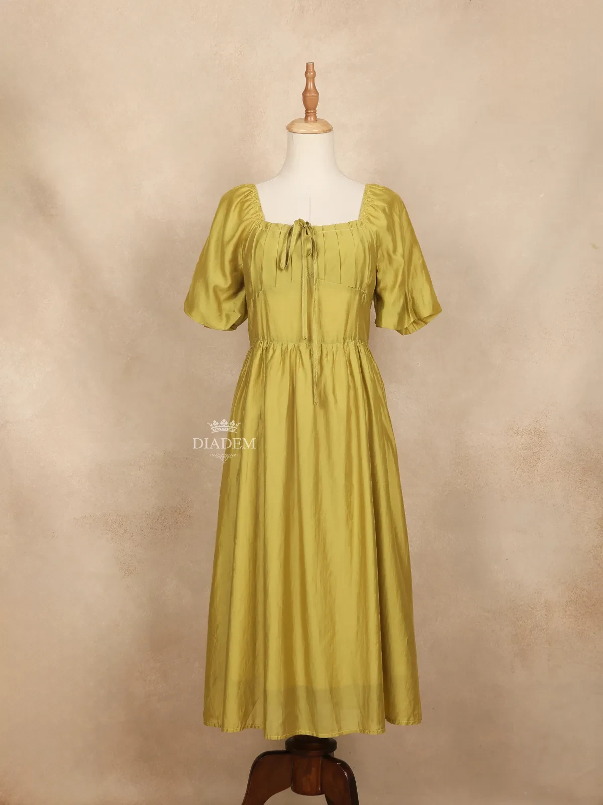 Olive Yellow Gown Adorned with Pleated and Plain Design and without Dupatta