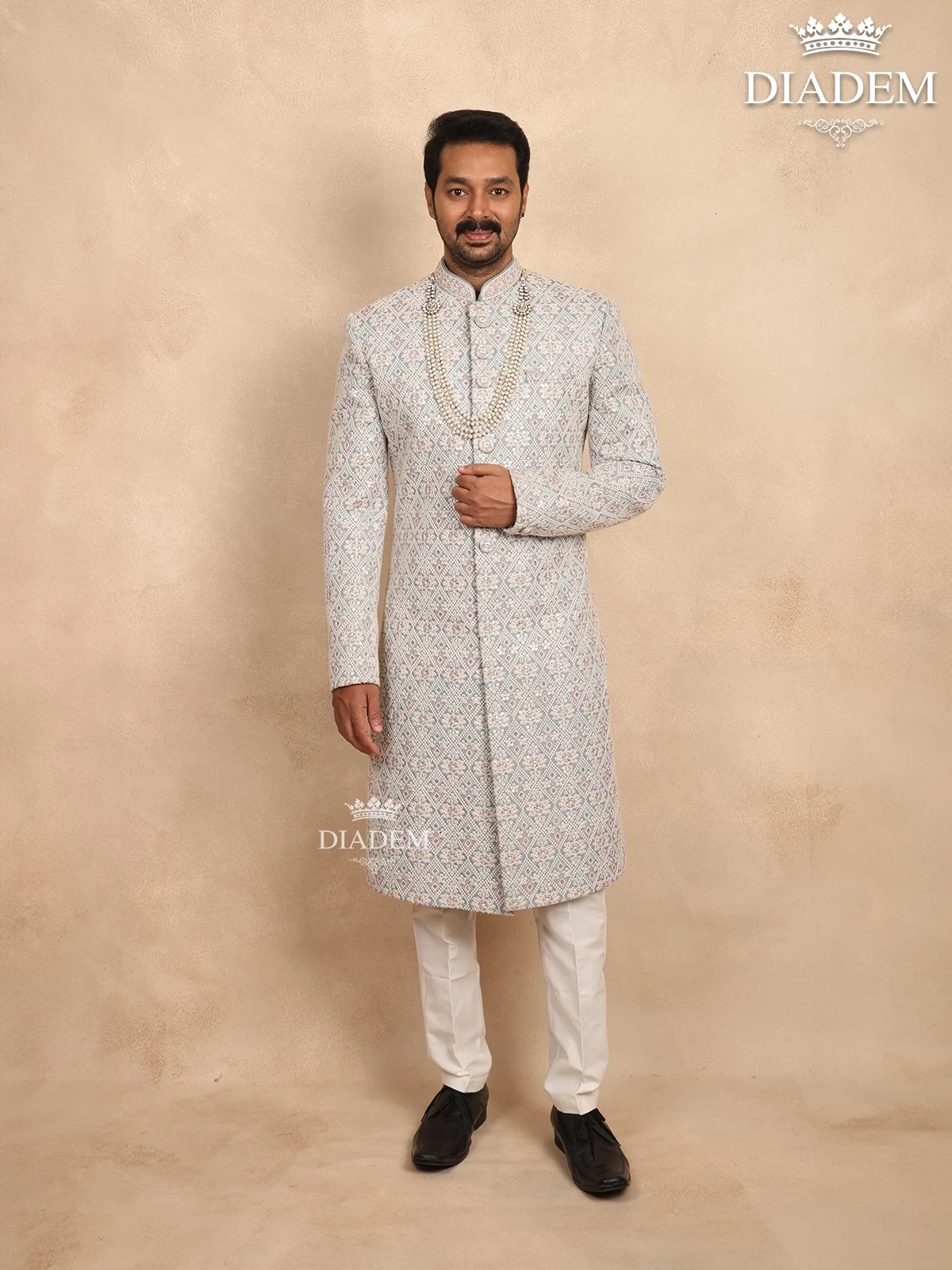 Ash Raw Silk Sherwani Suit with Threadwork Embroidery, Paired with Bead Mala