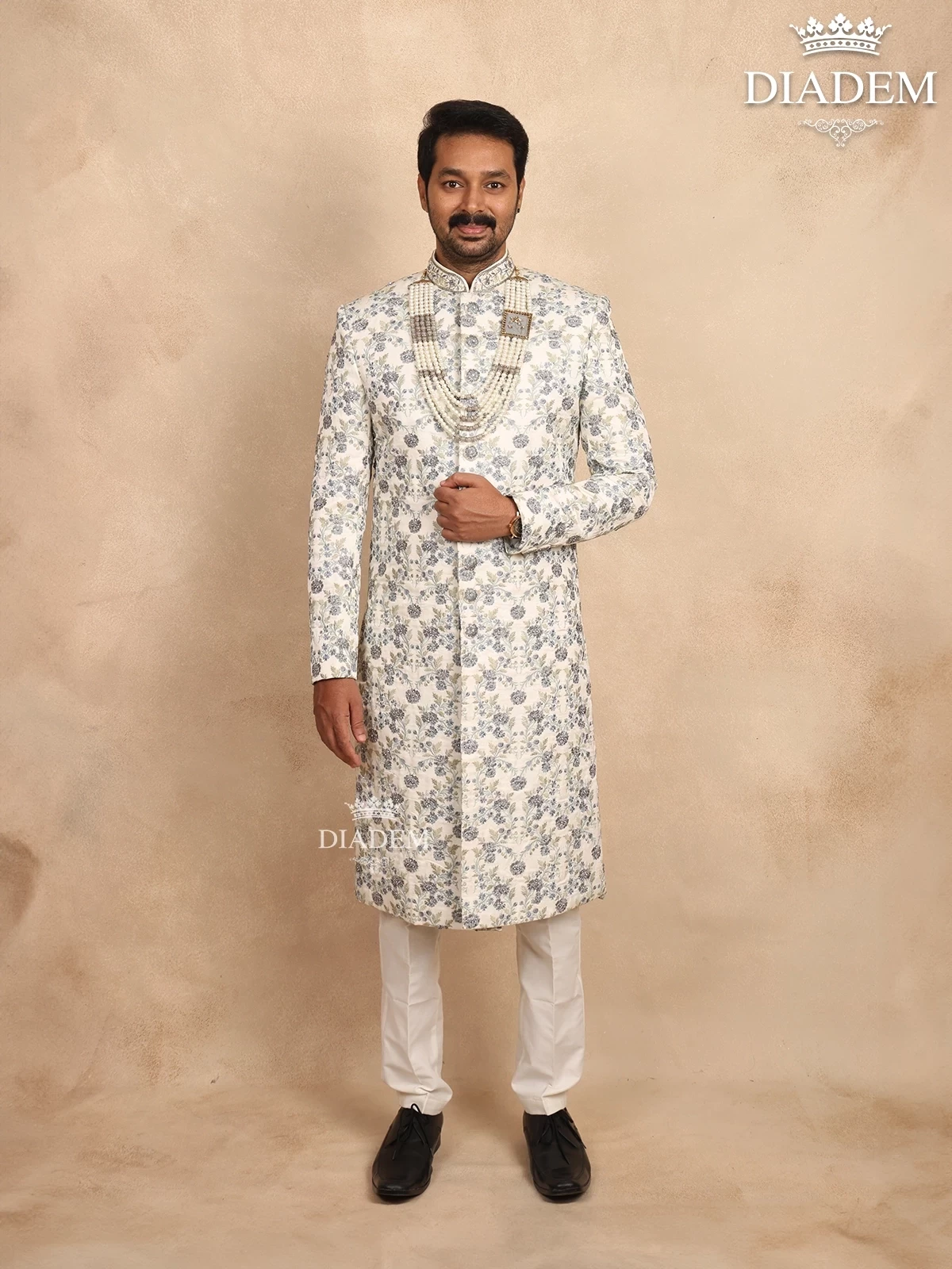 Ivory Silk Sherwani Suit with Floral Embroidery, Paired with Bead Mala