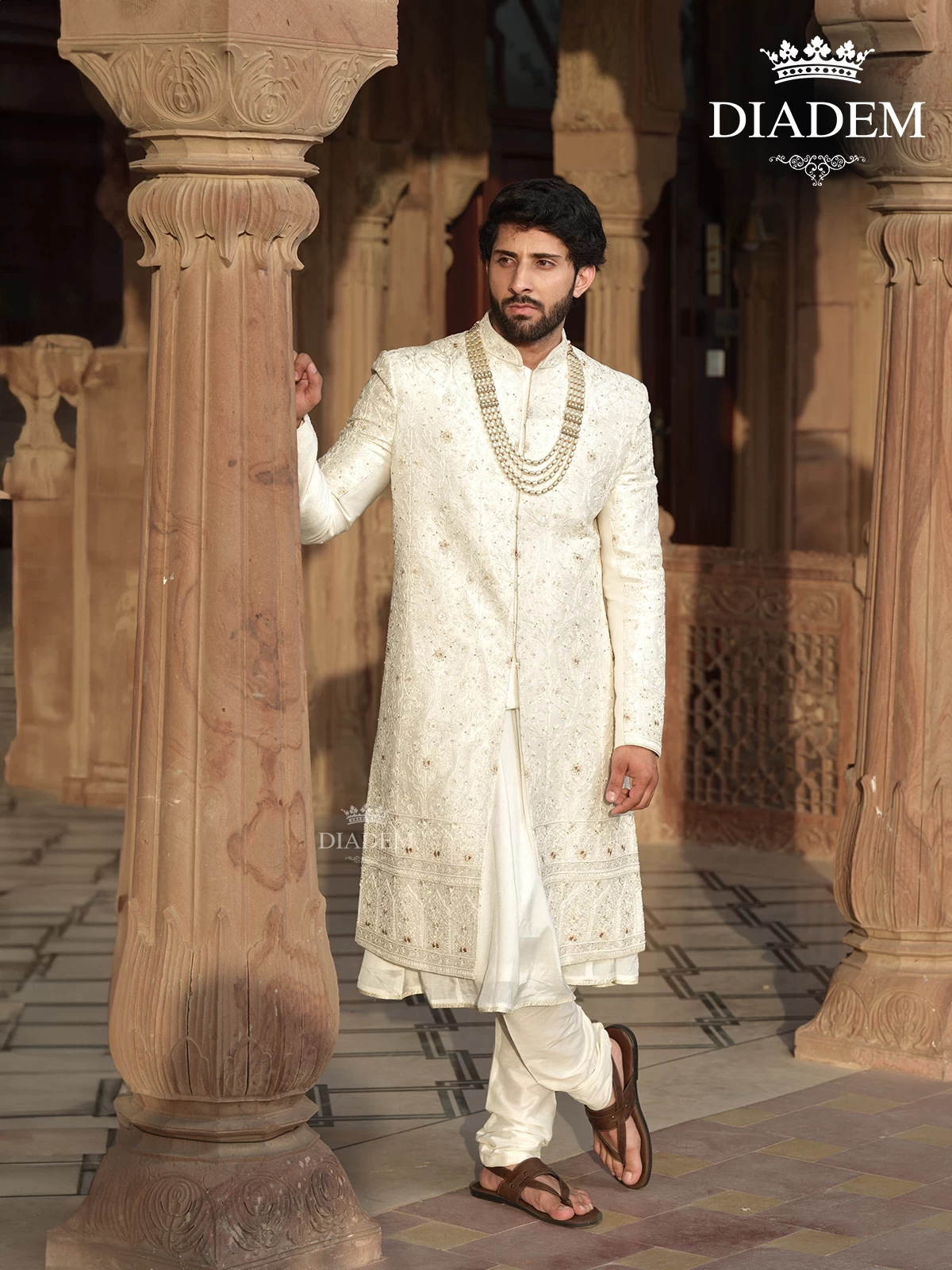 Off-White Raw Silk Sherwani Suit with Threadwork Embroidery and Stones, Paired with Beaded Mala