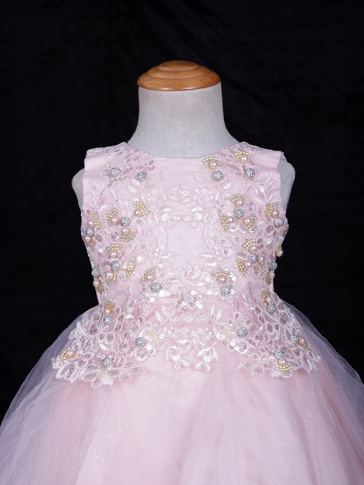 Light Peach Net Frock Embellished With Floral Laces And Pearl Beads