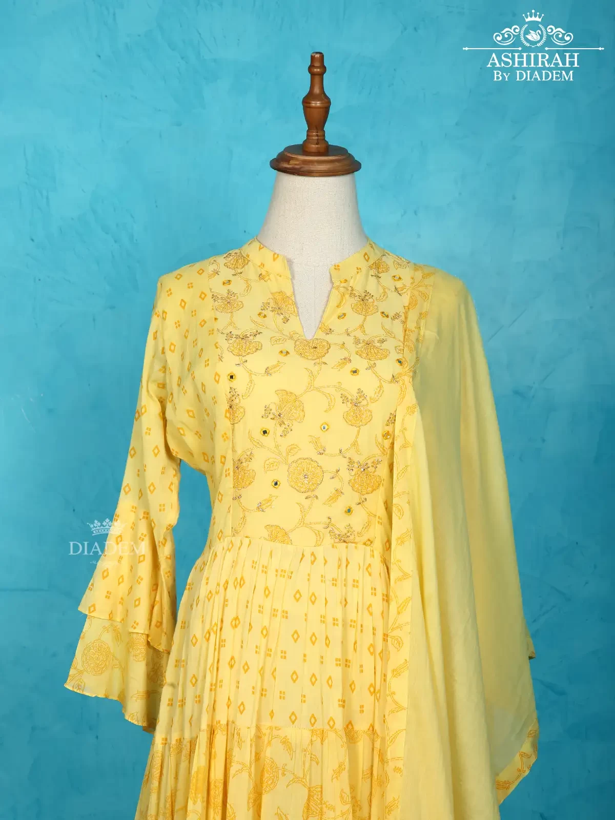 Yellow Cotton Anarkali Suit Enhanced With Floral Prints Along With Dupatta