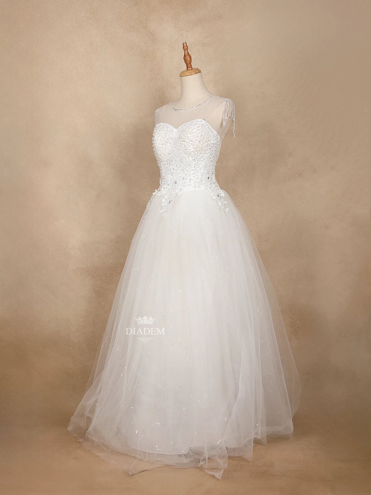 White Wedding Net Gown Adorned With Sequins And Bead Work With Beaded Tassels On Sleeve