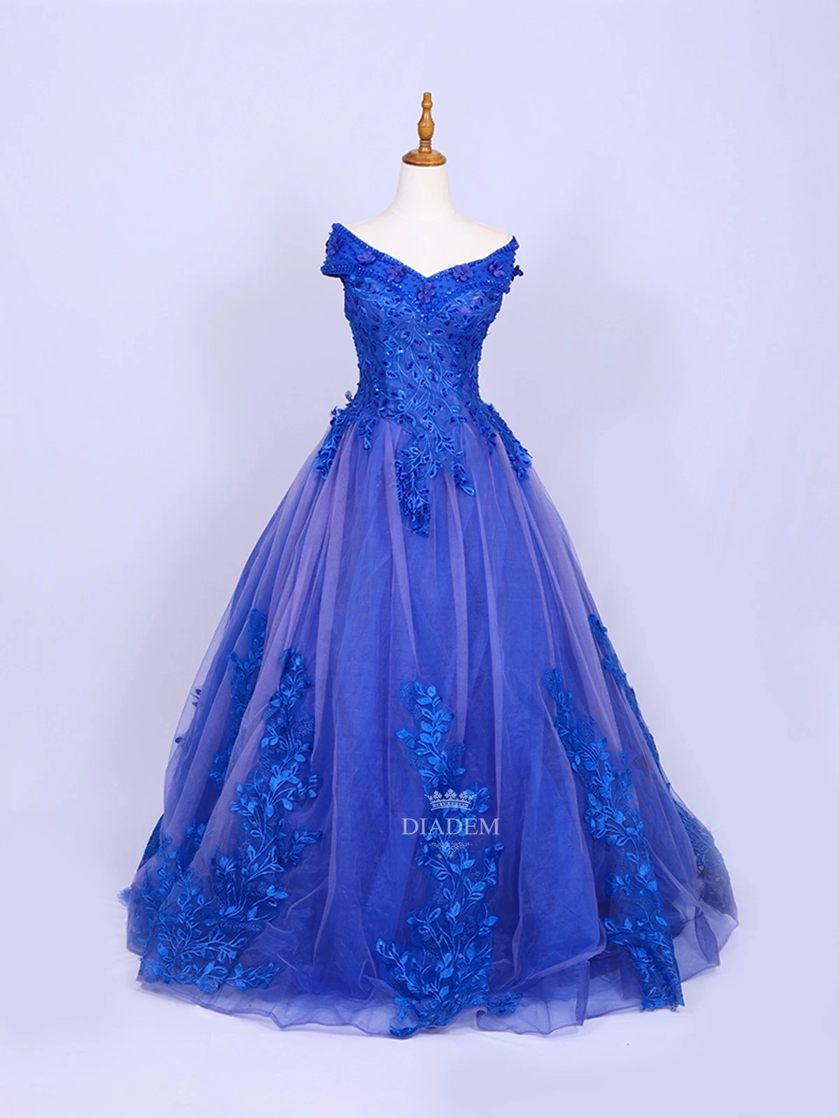 Royal Blue Net Off-Shoulder Gown Adorned with Floral Laces and Sequins