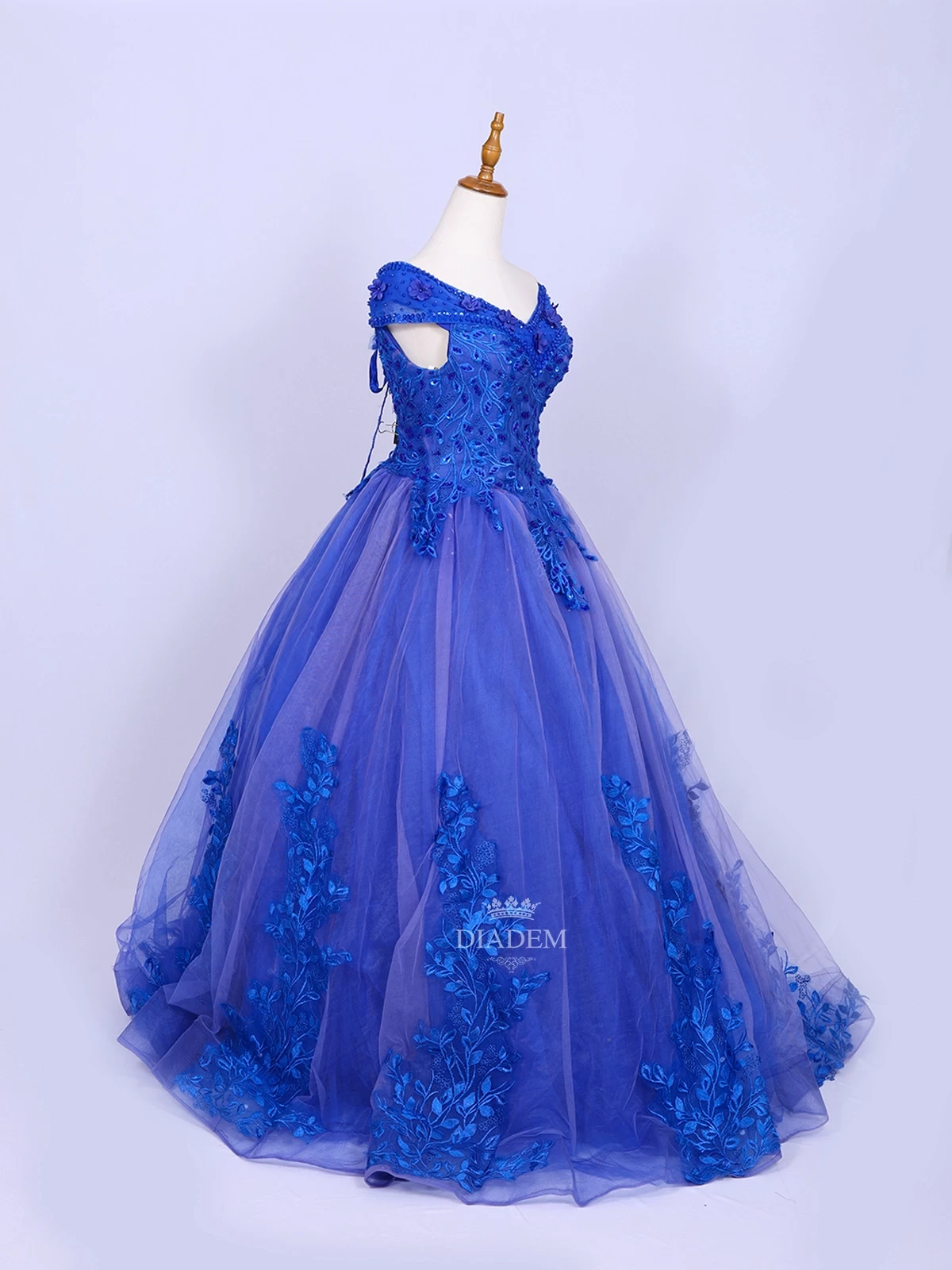 Royal Blue Net Off-shoulder Gown Adorned With Floral Laces And Sequins