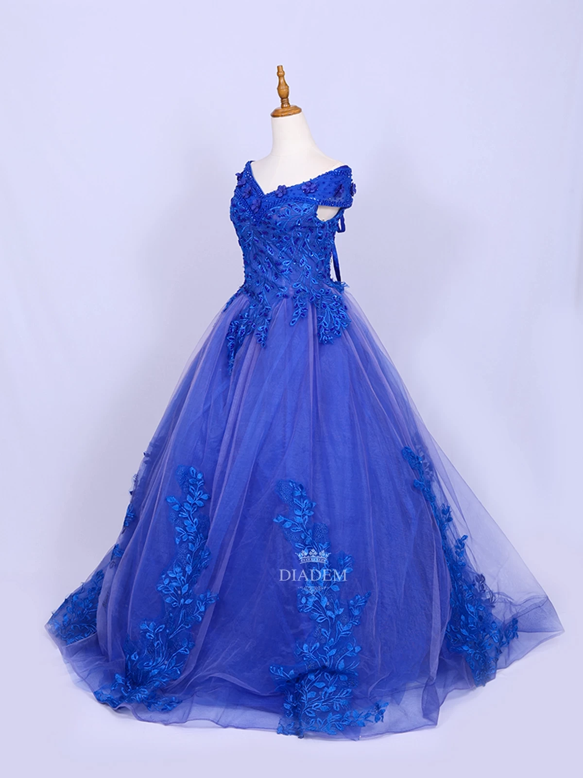 Royal Blue Net Off-shoulder Gown Adorned With Floral Laces And Sequins