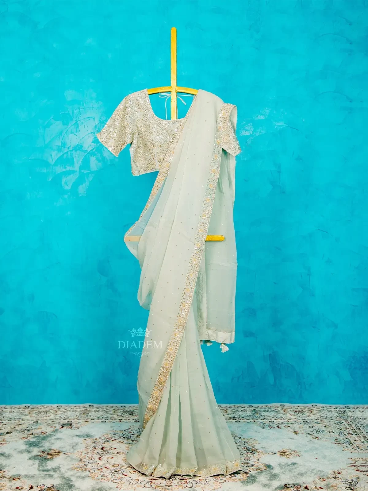 Mint Organza Saree Embellished with Sequins Border along with Designer Blouse