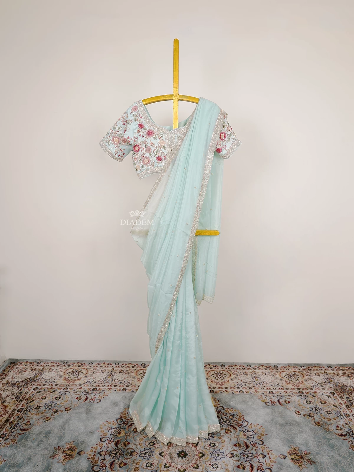 Light Blue Organza Saree with Sequins and Beads Embellished Border paired with Designer Blouse