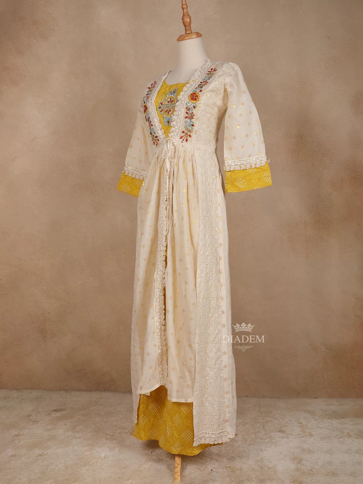 Yellow With White Kurti Adorned With Floral Prints And Thread Work Embroidery