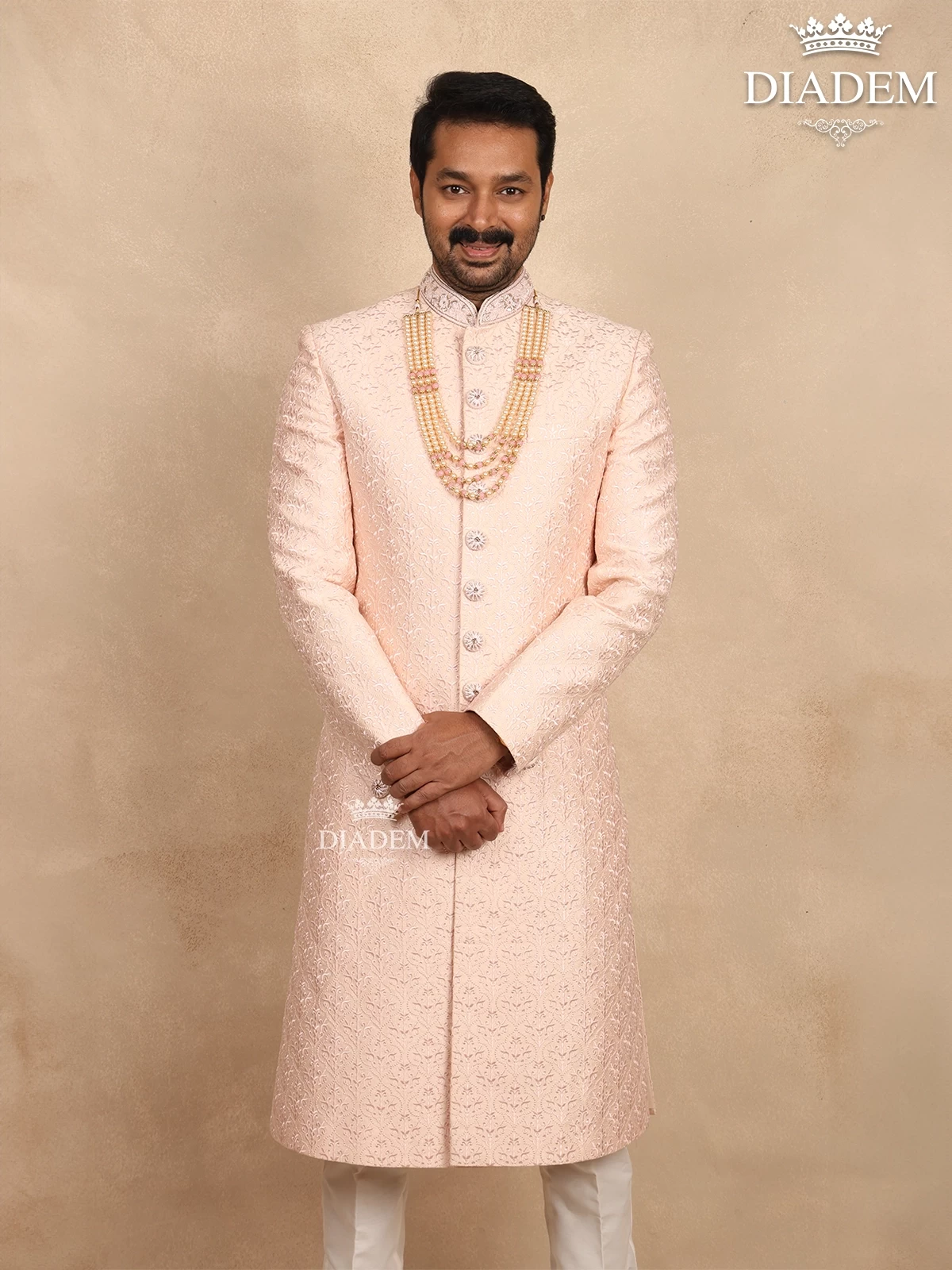 Light Peach Raw Silk Sherwani Suit Adorned With Floral Threadwork Embroidery, Paired With Bead Mala