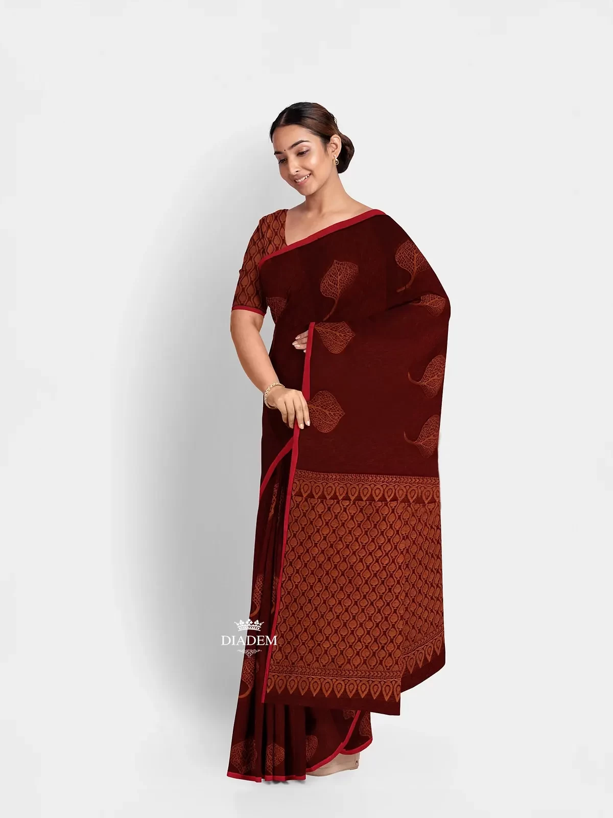 Maroon Silk Cotton Saree With Design Prints On The Body And Without Border