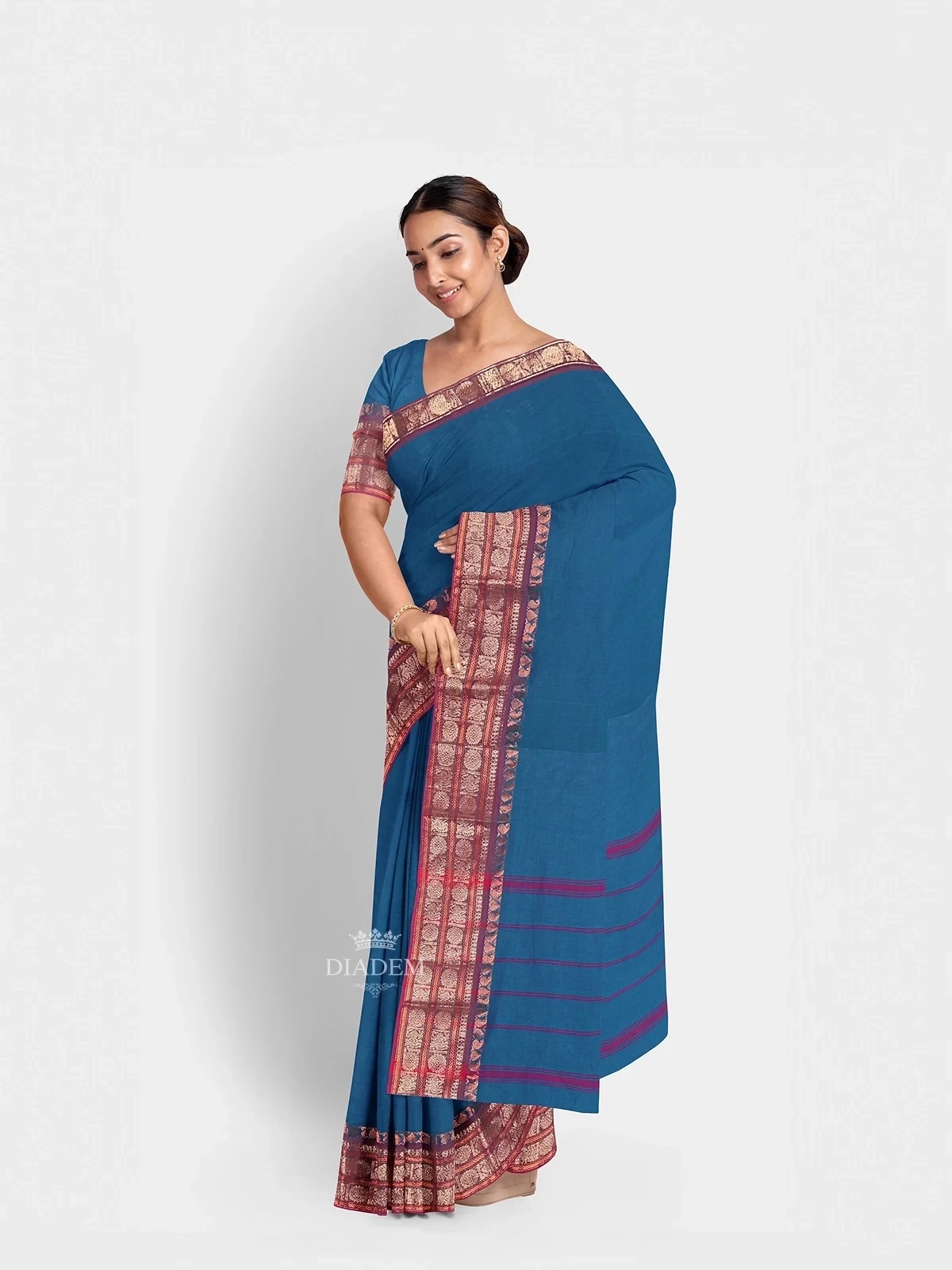 Peacock Blue Kanchi Cotton Saree With Plain Thread Butta On The Body And Zari Border