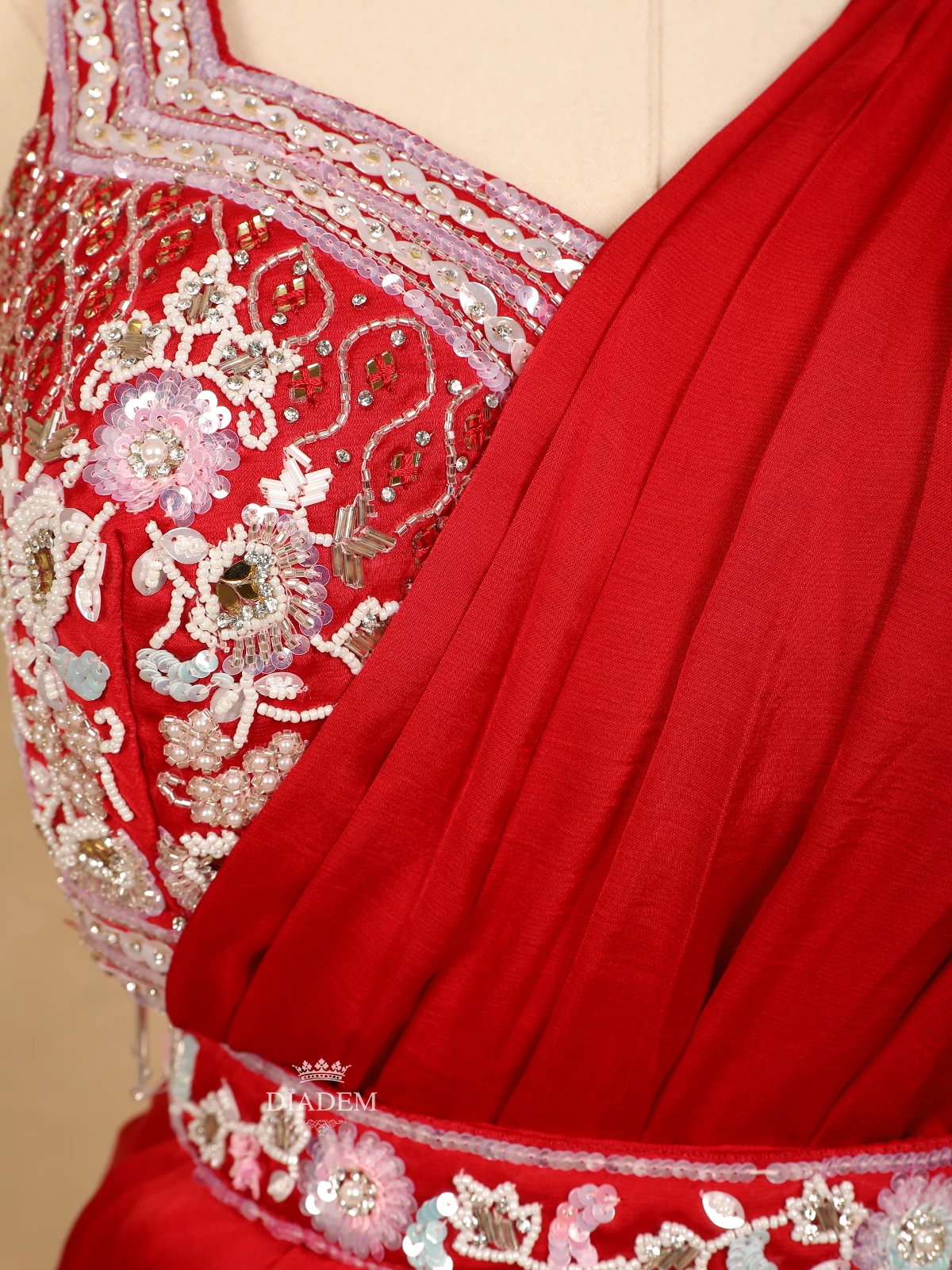 Red Satin Saree With Plain Body And Designer Blouse With Waist Belt